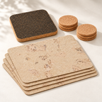 Saphire Cork Table Set for 4, four pale ivory cork placemats, six natural round cork coasters and dark square trivet — premium studio hero