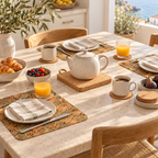 Four place settings with Iceberg Green cork placemats and natural cork coasters on a sunlit breakfast table