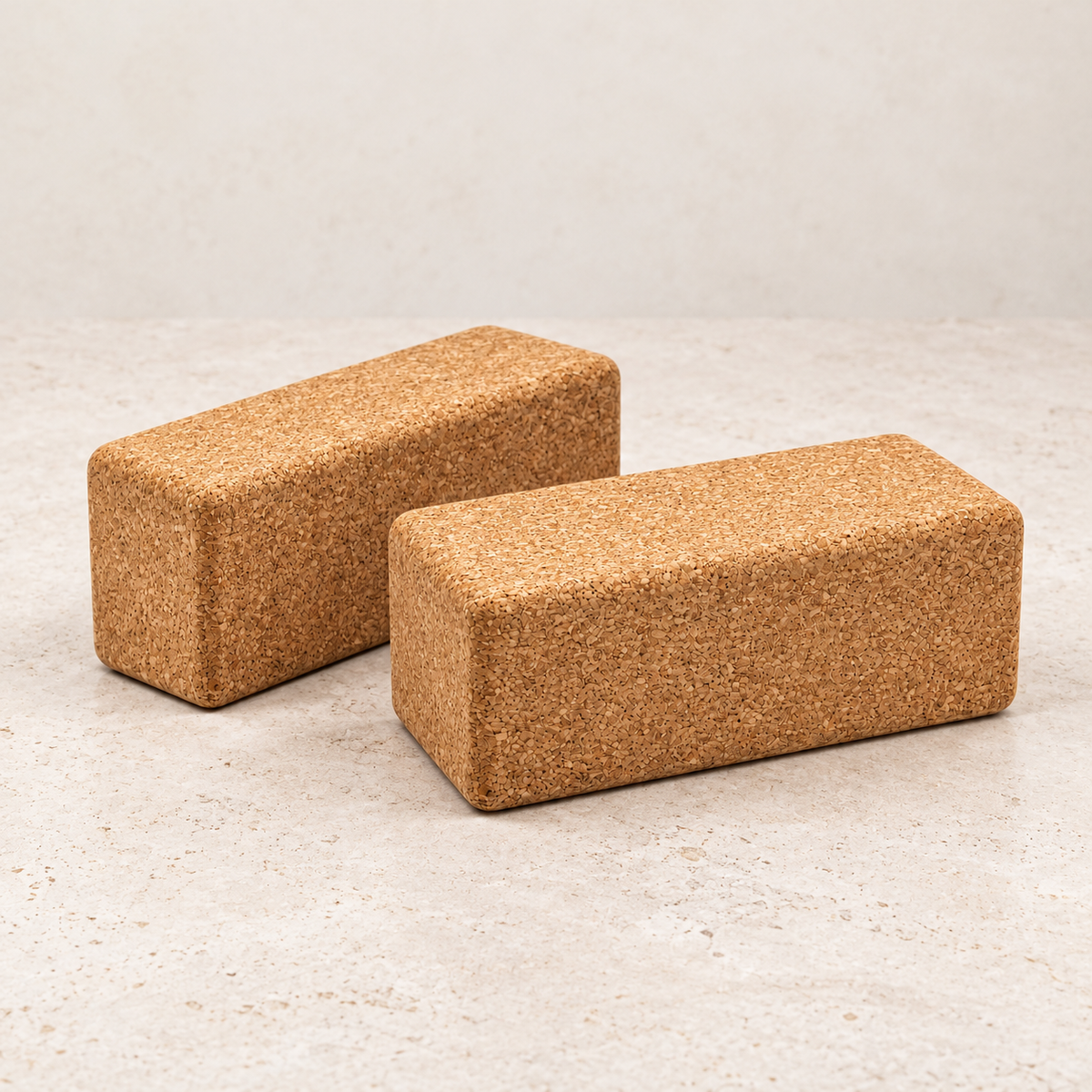 Side-by-side close view of two natural cork yoga blocks, each measuring 227 × 120 × 65 mm