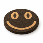 Smile Black cork trivet, Ø20 cm, angled view showing 15 mm thickness