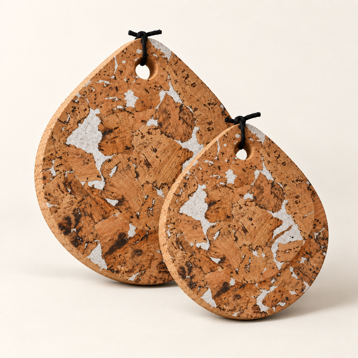 Drop Cork Trivet Set of 2 Fjord White - two graduated sizes in angled view