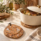 Fjord White drop cork trivet supporting hot cookware in a Mediterranean kitchen