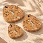 Tear-Shaped Cork Trivet Set of 3 Fjord White - angled view showing three sizes