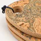 Pebble cork trivet - close-up of natural marbled cork texture, edge and hanging loop