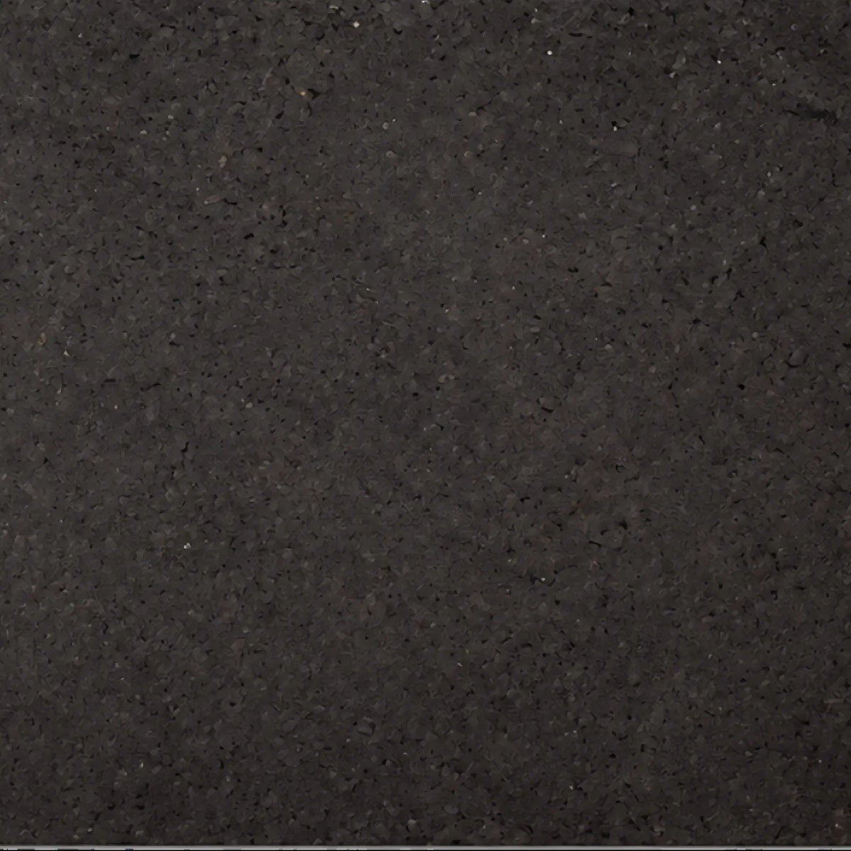 Acoustic Black cork acoustic wall tile close-up showing the real dark cork texture and waxed surface