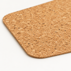 Macro close-up of Agglo cork placemat surface, rounded corner and 2 mm thin edge