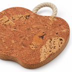 Close-up of Apple-Shaped Cork Trivet IceRed cork texture and rope handle
