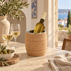 Barrel cork wine cooler with chilled bottle and glasses in a warm Mediterranean lifestyle setting