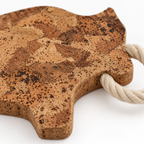 Close-up of Bull-Shaped Cork Trivet Angola texture and rope loop