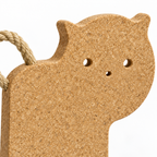 Close-up of Cat-Shaped Cork Trivet natural cork texture, face details and rope tail