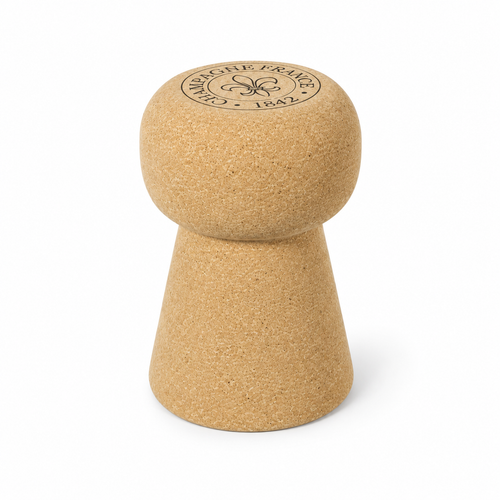 Champagne Stopper Cork Stool, angled studio view showing the champagne-stopper silhouette and engraved top detail