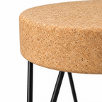 Macro detail of natural cork seat edge and black metal zig-zag structure