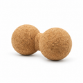 Cork double massage ball, peanut shape with two connected Ø80 mm cork spheres on white background
