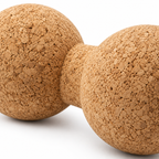 Macro detail of natural cork texture and central connection on the double massage ball