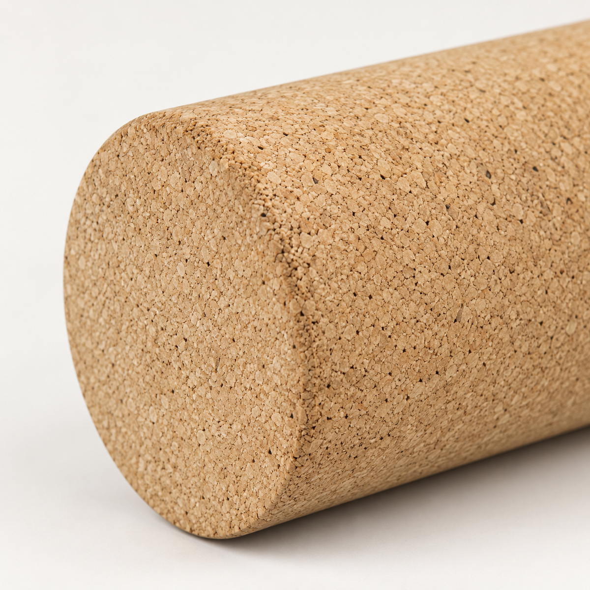 Macro detail of natural cork texture and rounded edge on Cork Exercise Roller