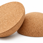 Macro detail of natural cork texture, flat standing surface and rounded curved base on Cork Half-Moon Balance Board