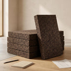 Stacked expanded cork boards showing natural cork texture and thickness