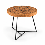 Cork & Metal Side Table, angled studio view showing round cork top and black geometric metal frame