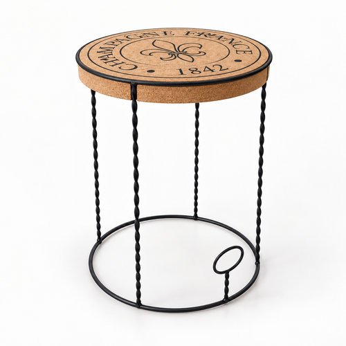 Cork & Metal Table, angled studio view showing round cork top and open black metal frame