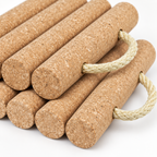 Close-up of Cork Raft Trivet cork texture and braided rope handle