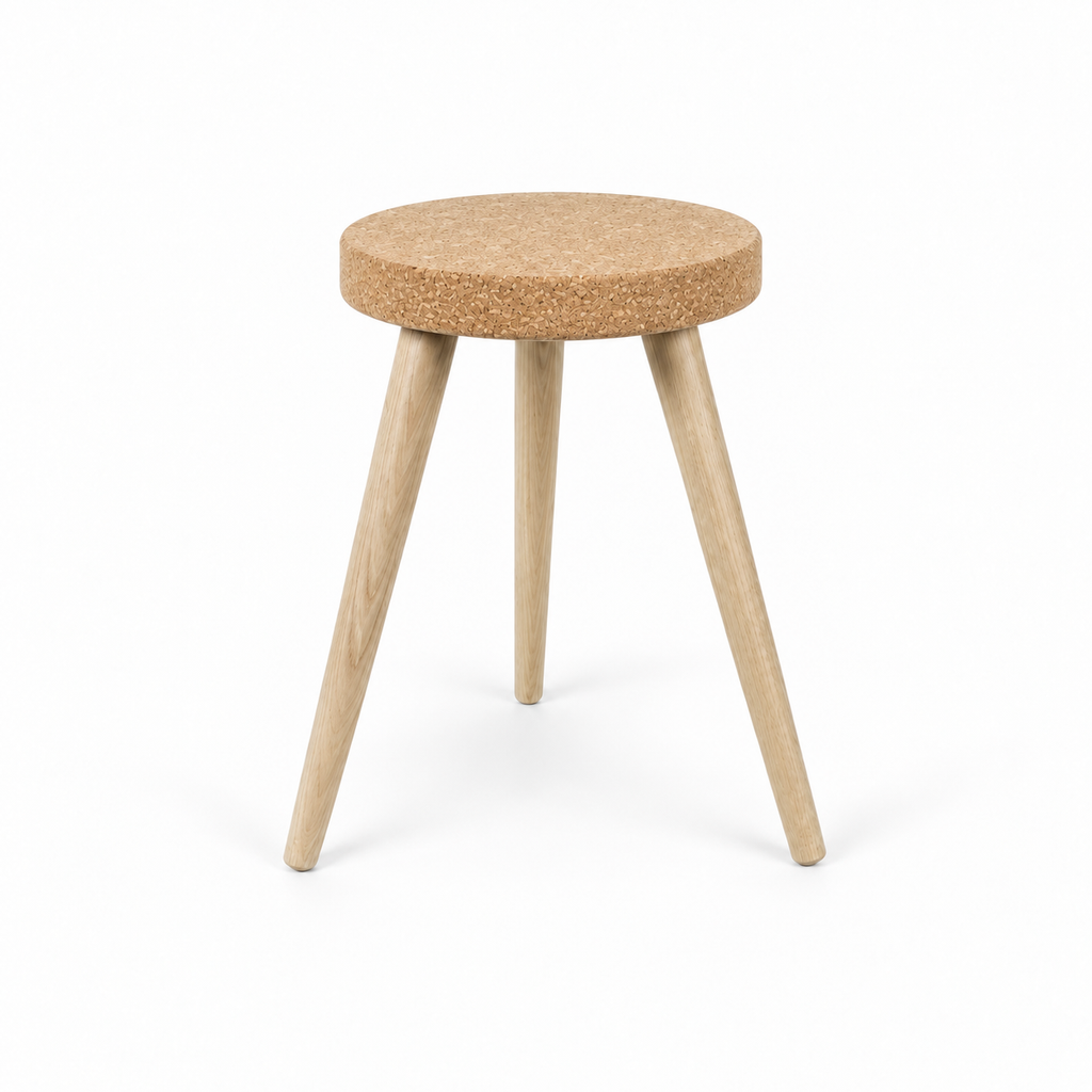 Cork Stool with 3 Wooden Legs, angled studio view showing round cork seat and three light wooden legs