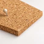Macro detail of natural cork texture and 7 mm tile thickness with push pin
