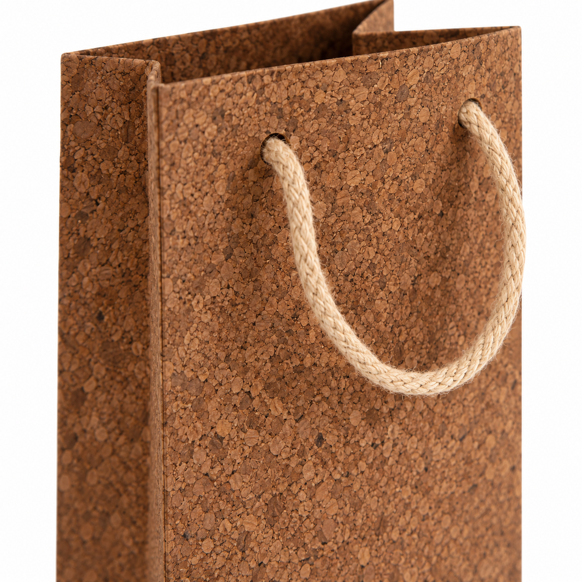 Cork Wine Bottle Gift Bag | Brown Finish — macro detail of brown cork-textured surface and cord handle