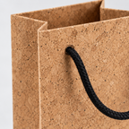 Cork Wine Bottle Gift Bag | Natural Finish — macro detail of cork-textured surface and black cord handle