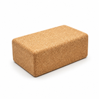Cork yoga block 75 mm, 227 × 120 × 75 mm, angled studio view showing rounded edges and natural cork texture