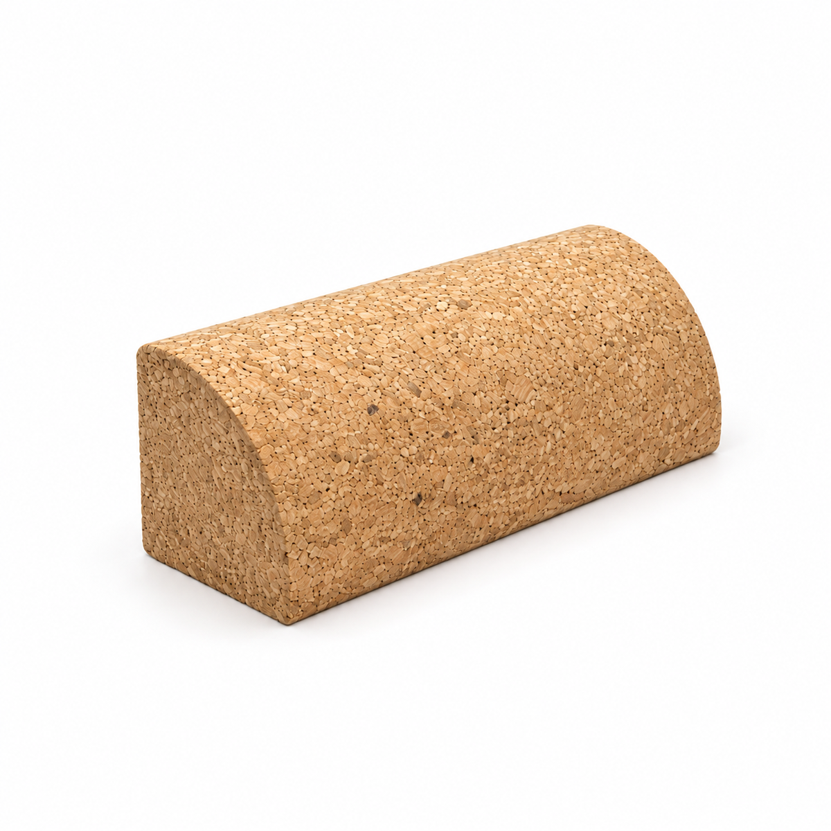 Cork yoga quarter-round block, angled studio view showing flat base and curved upper profile