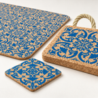 Macro detail of the Portuguese Tile cork placemat, small coaster and substantial 20 mm trivet showing cork grain, blue motif and braided loop
