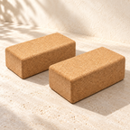 Pair of two identical natural cork yoga blocks, deeper 227 × 120 × 75 mm size, premium product photo