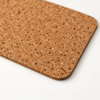 Macro close-up of Country cork placemat surface, rounded corner and thin edge
