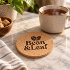 Custom Laser-Engraved Cork Coasters | 95 × 6 mm — engraved cork coaster in a tea setting
