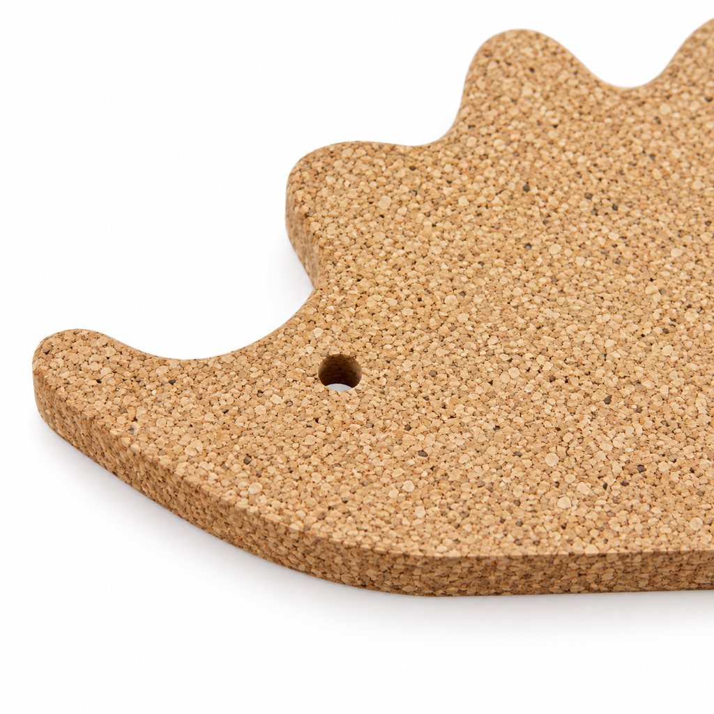 Close-up of Hedgehog-Shaped Cork Trivet natural cork texture and eye detail