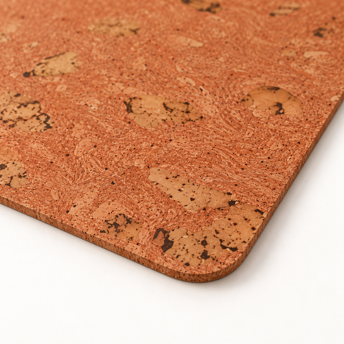 Macro close-up of Iceberg Red cork placemat surface, rounded corner and thin edge