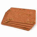 Stack of four Iceberg Red cork placemats showing thin profile and rounded corners