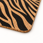 Macro close-up of Jungle cork placemat surface, rounded corner and thin edge