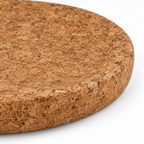 Macro detail of large round cork centrepiece tray texture and rounded 50 mm edge