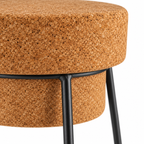 Macro detail of natural cork seat and black metal structure on Muselet Small Stool