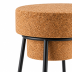 Macro detail of natural cork seat and black metal structure on Muselet Cork & Metal Tall Stool