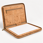 Angled view of the open natural cork business portfolio showing its interior and zip-around edge.