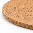 Oval Cork Trivet | 9 mm | 2 Sizes — macro detail of natural cork texture and rounded edge