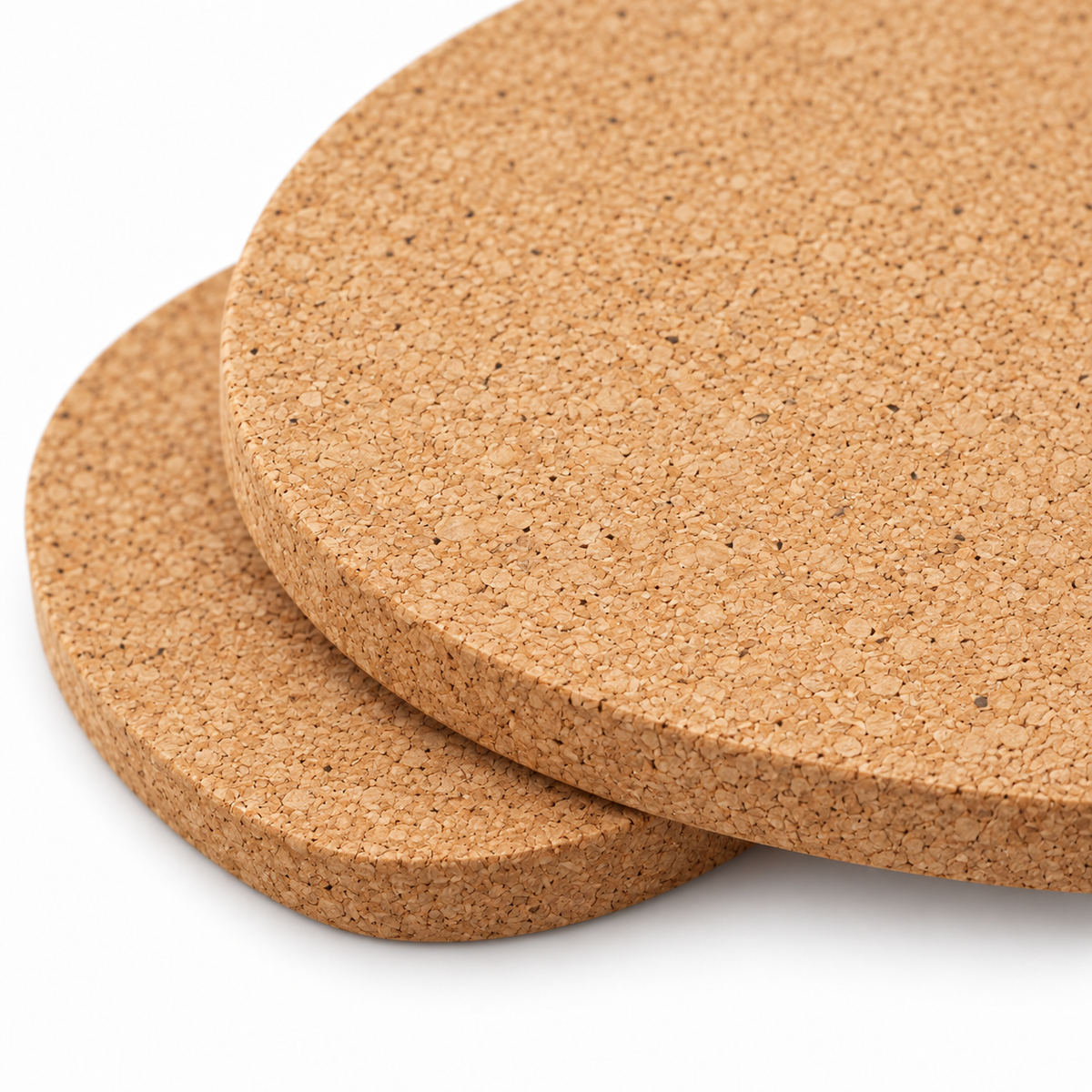 Macro detail of natural cork texture and 9 mm edge on oval trivet set