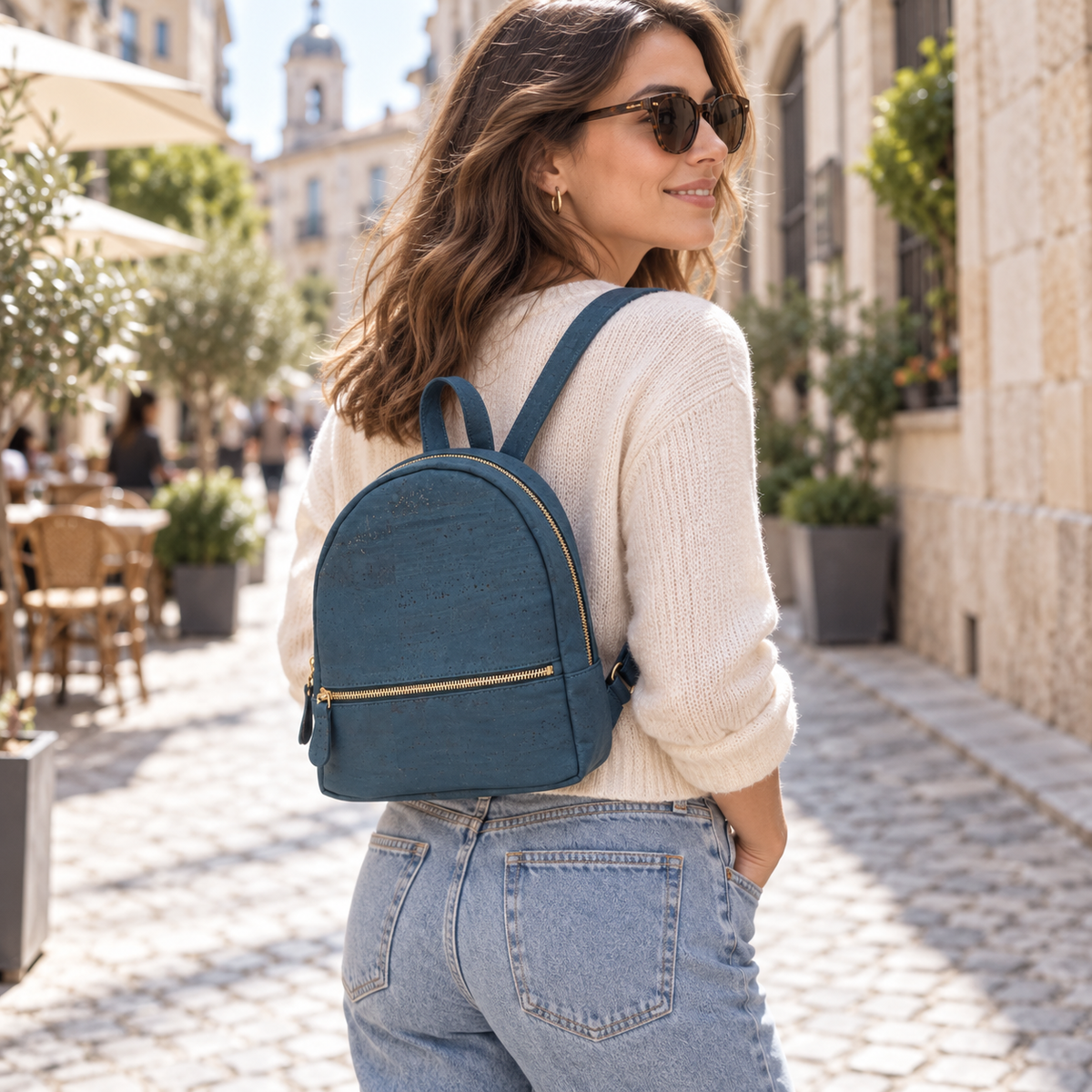 Petite Blue Cork Mini Backpack in real everyday urban use