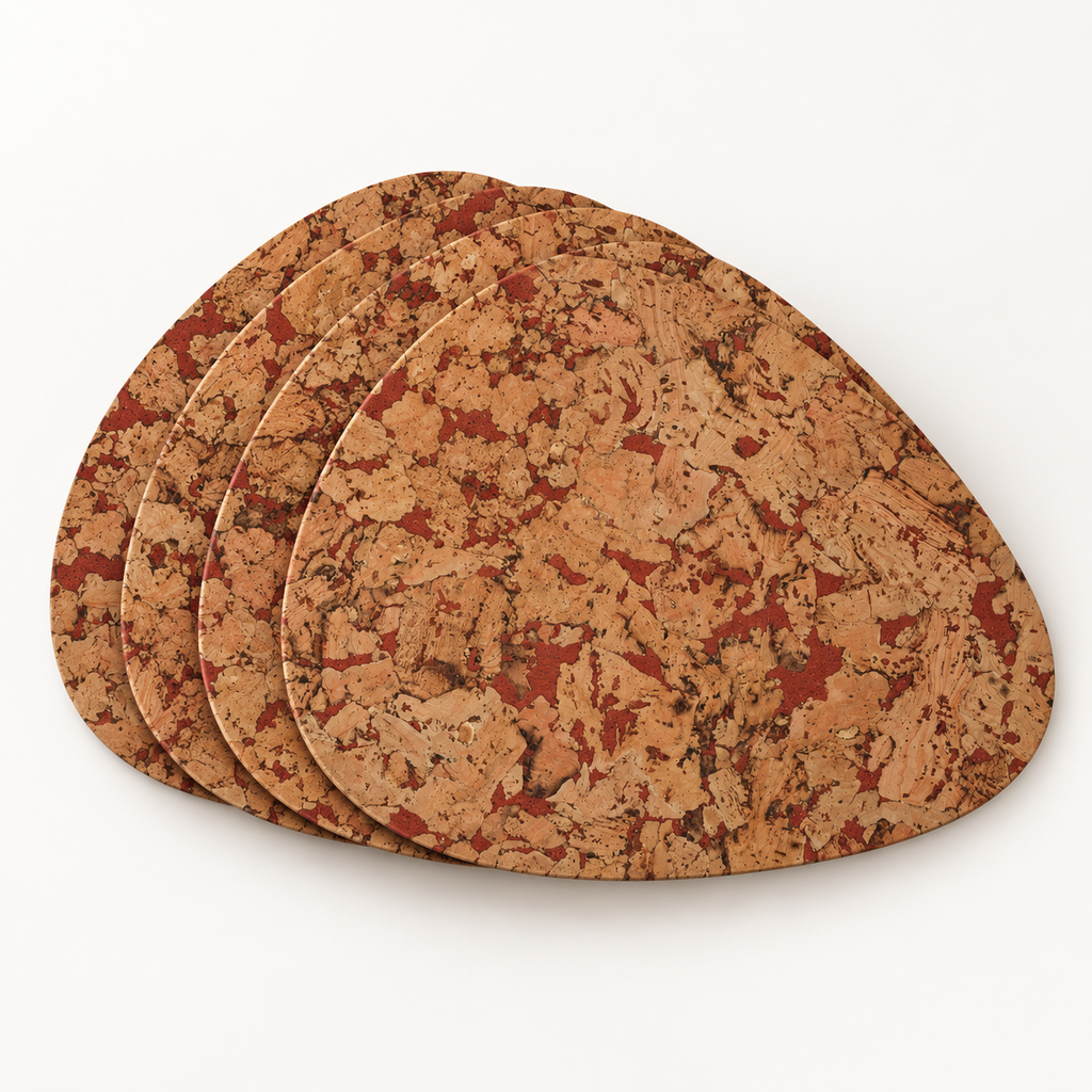 Stack of four Pick Fjord Maroon cork placemats showing the organic teardrop profile