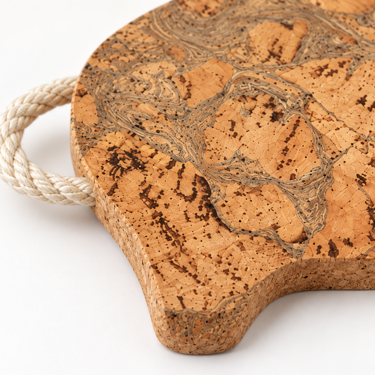 Close-up of Pig-Shaped Cork Trivet Icegrey cork texture and rope loop