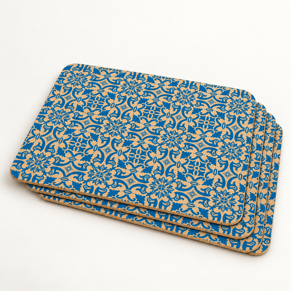 Stack of four Portuguese Tile cork placemats showing patterned surfaces, thin profile and rounded corners