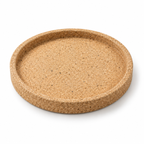 Round natural cork serving tray, angled studio view showing the 30 mm profile