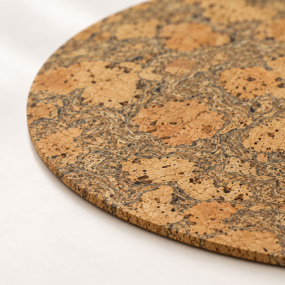 Macro close-up of round natural cork placemat surface and thin 3 mm edge